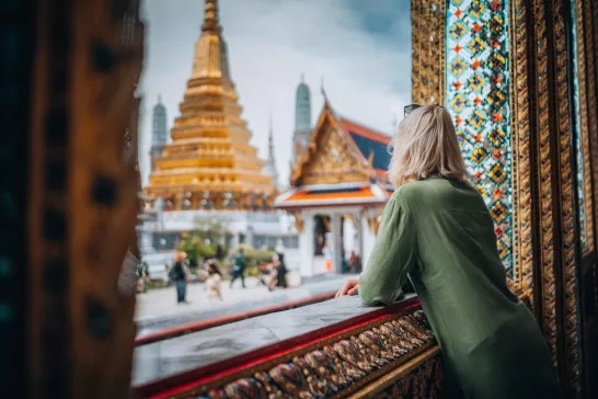 Woman admiring the view in the Golden Temple, Thailand