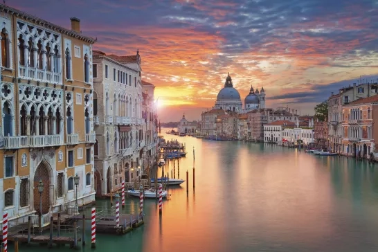 Sunset over a canal in Venice, Italy