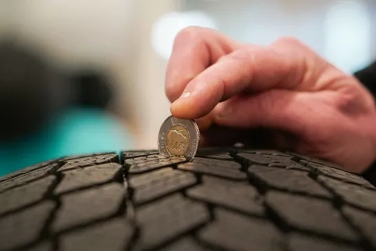 Close up of coin in tire