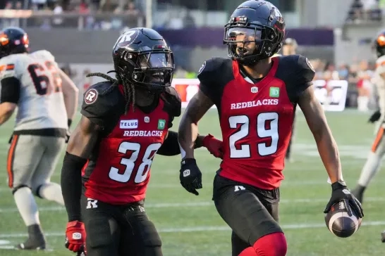 Ottawa REDBLACKS football player celebrate after making a big play