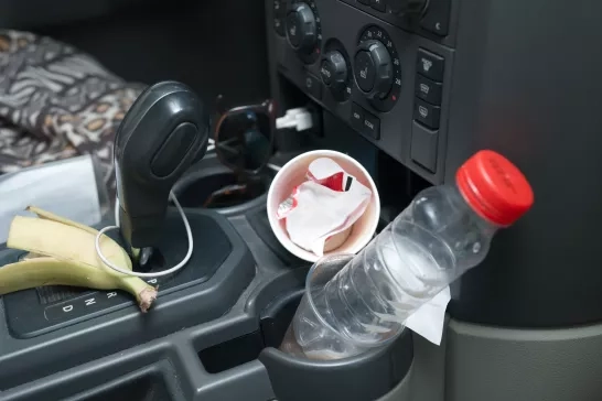 Closeup of trash in car