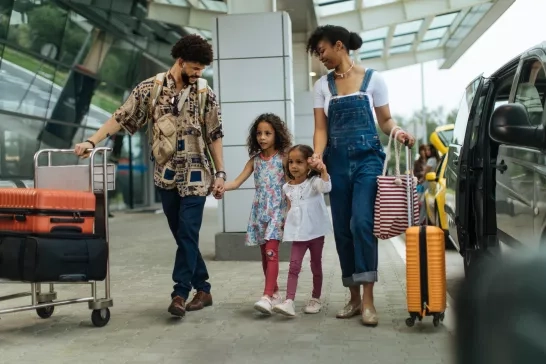 Family arrives at the airport ready to take the plane