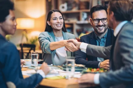 Multiracial group of business persons in a restaurant