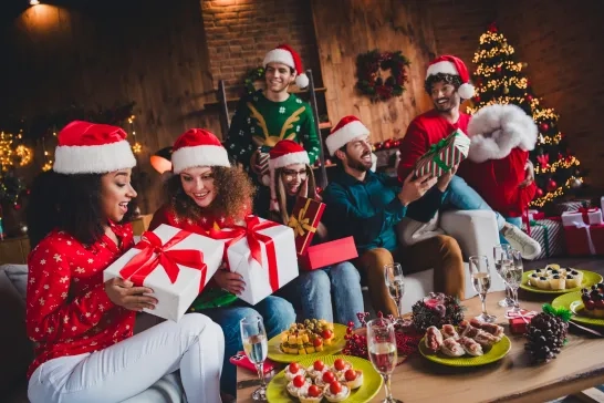 people sit couch present box
