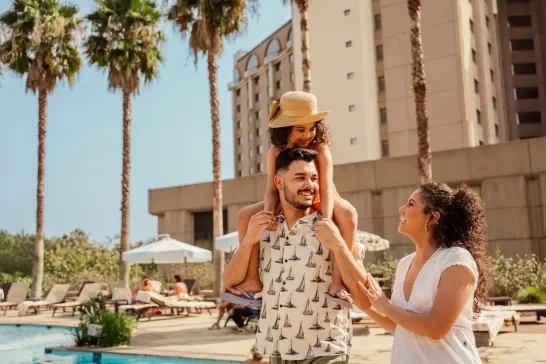 Family taking vacation in luxury hotel