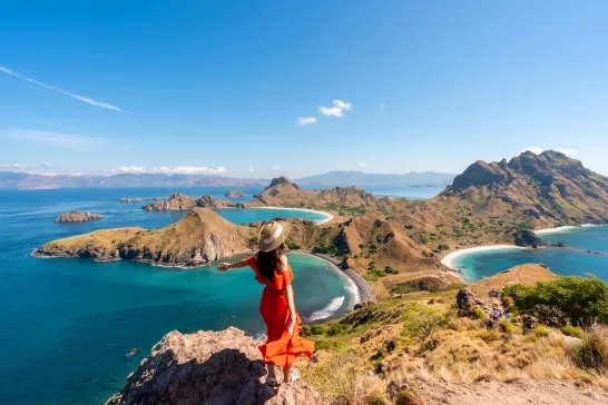tourist enjoying the landscape at Padar Island, Indonesia