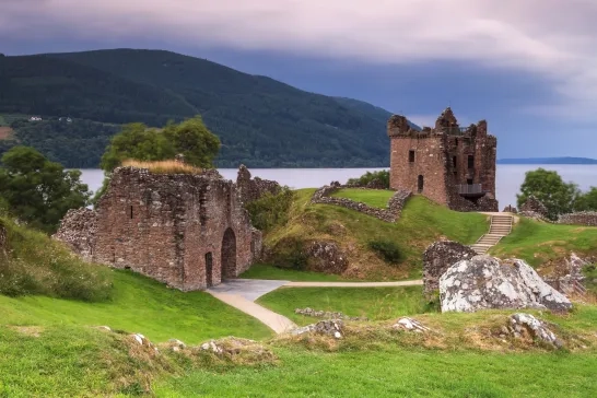 The Loch Ness Castle at dusk in Scotland