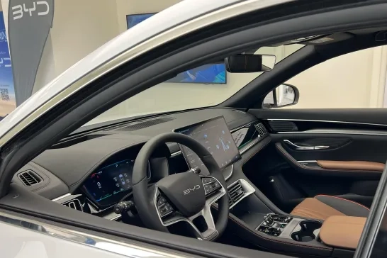 BYD Atto 3 electric vehicle's modern interior with dashboard and driver's seat