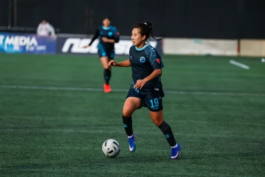 Professional female soccer player for Rapid FC