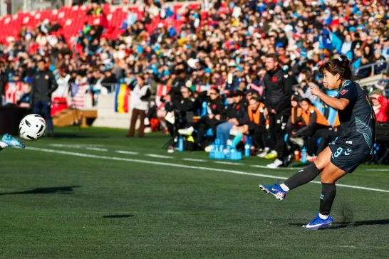 Ottawa Rapid FC player kicking ball