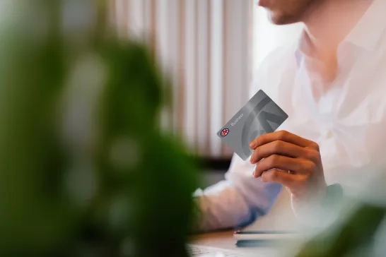Person holding CAA Membership card