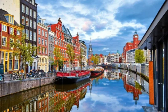 Colourful houses along the canal in Amsterdam