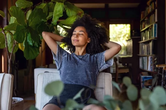 Young woman spending a relaxing day in her beautiful home