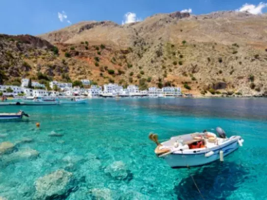 Boat in the water in Crete, Greece