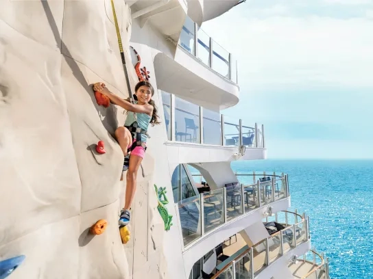 Child on the rock climbing wall on Royal Caribbean's Allure of the Seas