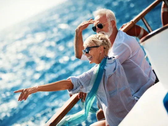 Senior couple on a sailing cruise