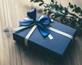 Blue wrapped gift with bow