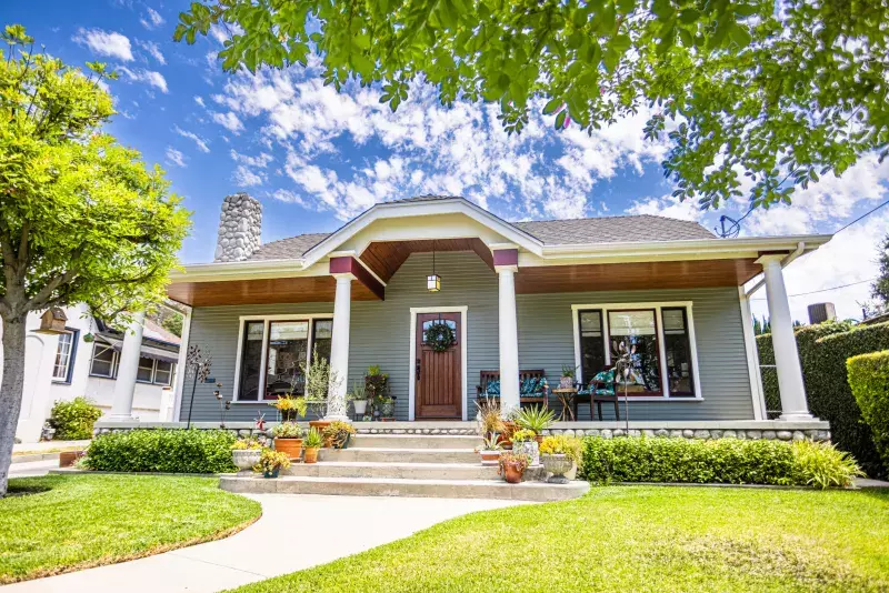 front of bungalow on sunny day