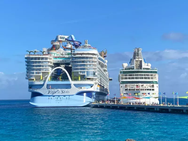 two cruise ships docked at port including Royal Carribean's new Icon of the seas