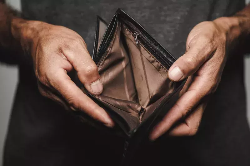 Close up of man hands holding and empty wallet. financial crisis, bankruptcy, no money, bad economy Concept.