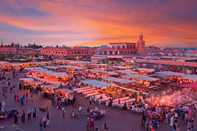 Evening on Djemaa El Fna Square with Koutoubia Mosque, Marrakech, Morocco