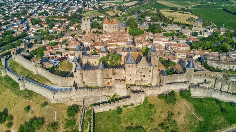 Aerial top view of Carcassonne medieval city and fortress castle from above, Sourthern France