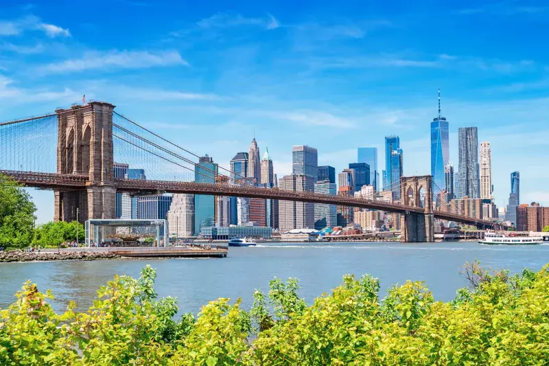 The Brooklyn Bridge and the skyline of New York City USA