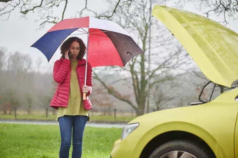 young-woman-calling-for-roadside-assistance