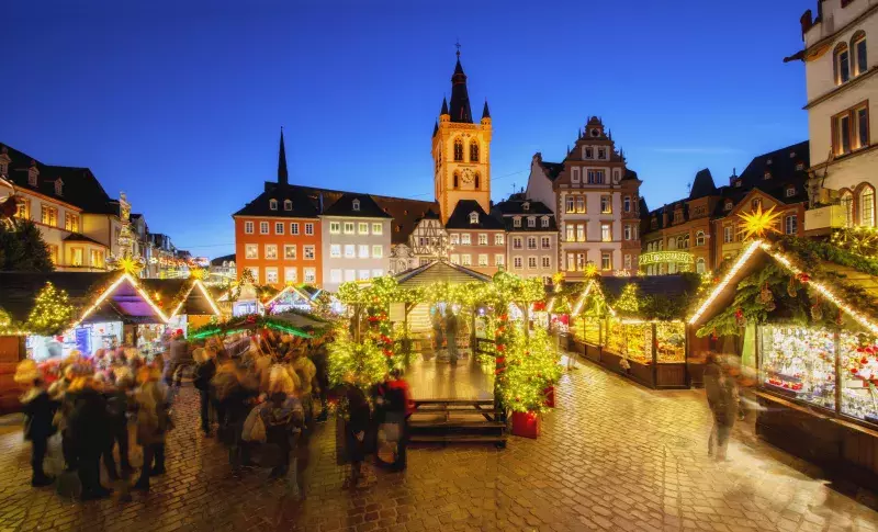 View over Trier´s main square and christmas market at dusk. Trier, located in Rheinland-Pfalz is German oldest city and looks back at 2000 years of history.