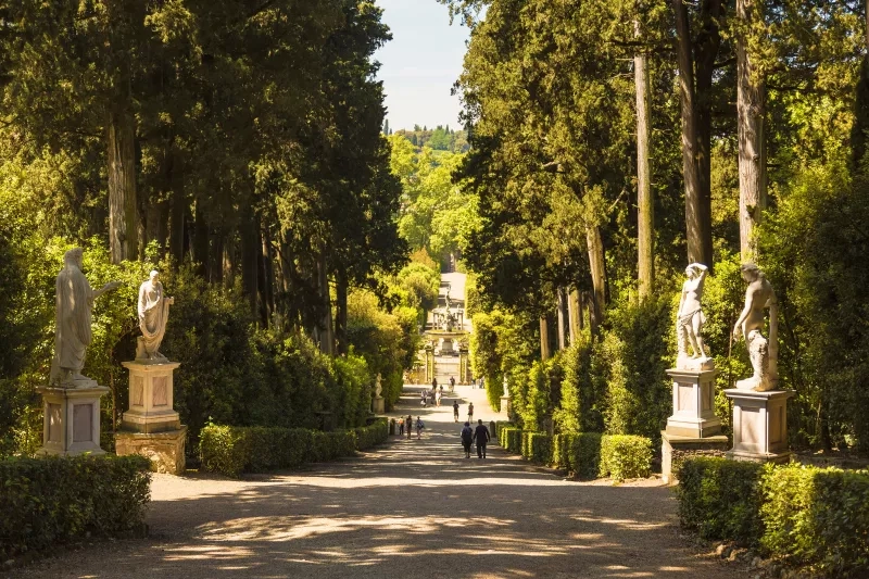 Park alley with statues in the Boboli gardens. Florence.