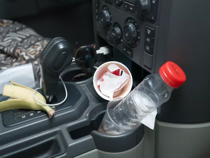 Closeup of trash in car