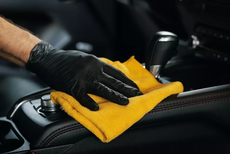  closeup of hand with microfiber cloth 
