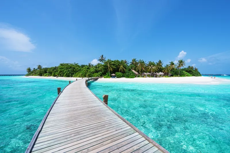 Boardwalk into tropical paradise island