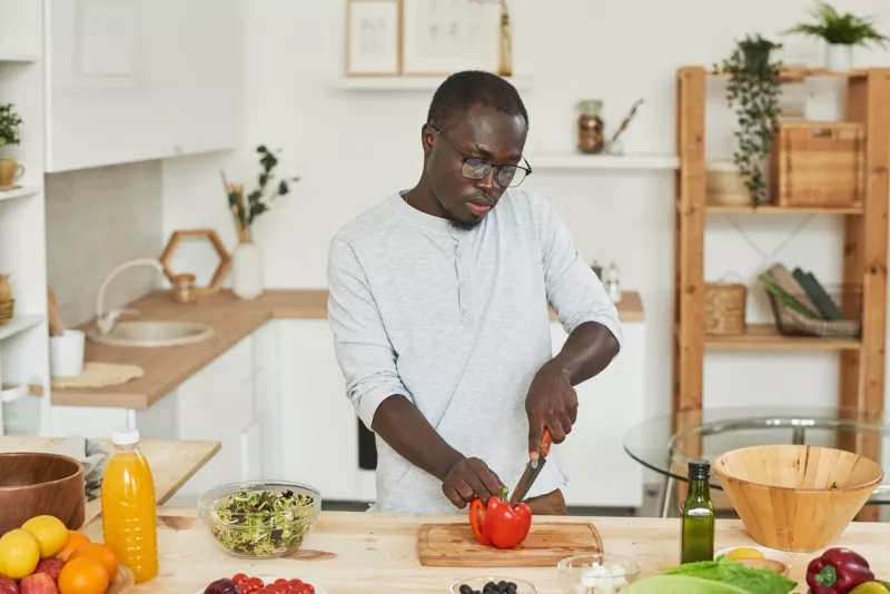 Man cutting vegetables
