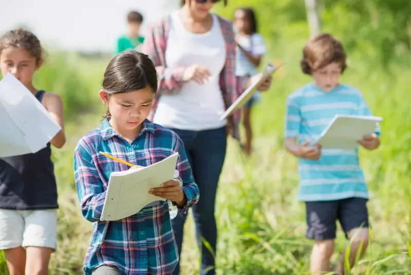 kids playing game in nature