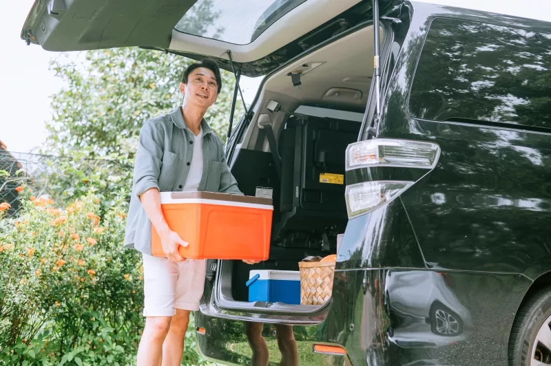 Loading cooler into car