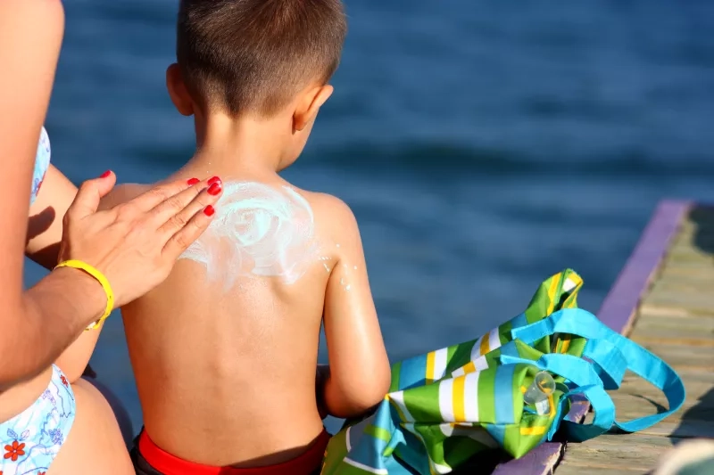 Applying sunscreen