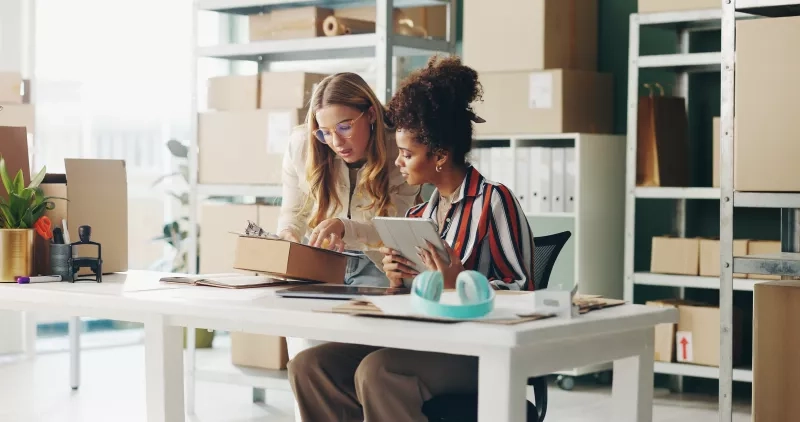 Small business, two women talking