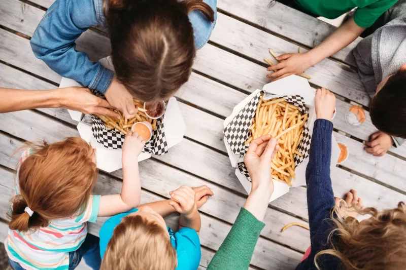 people eating french fries