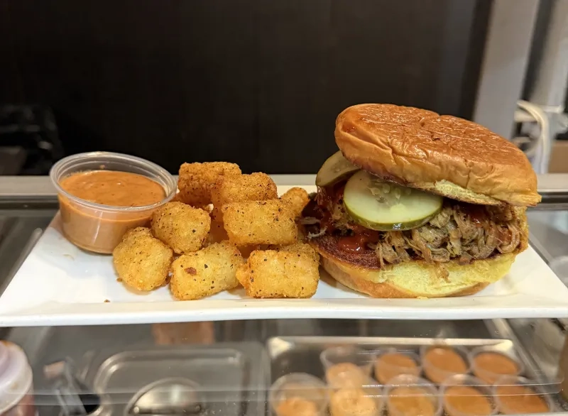 crispy tater tots, dunked in smoky chipotle mayo, paired with their pulled pork sandwich