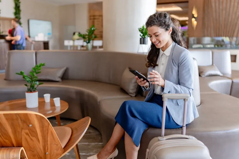 women in airport lounge