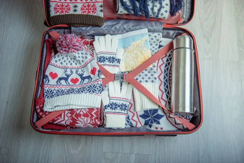 Suitcase with winter clothes
