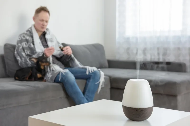 diffuser on a white table on the background of the interior