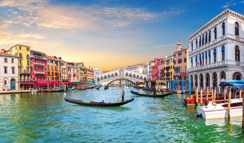 Venice Grand Canal with gondoliers, Italy