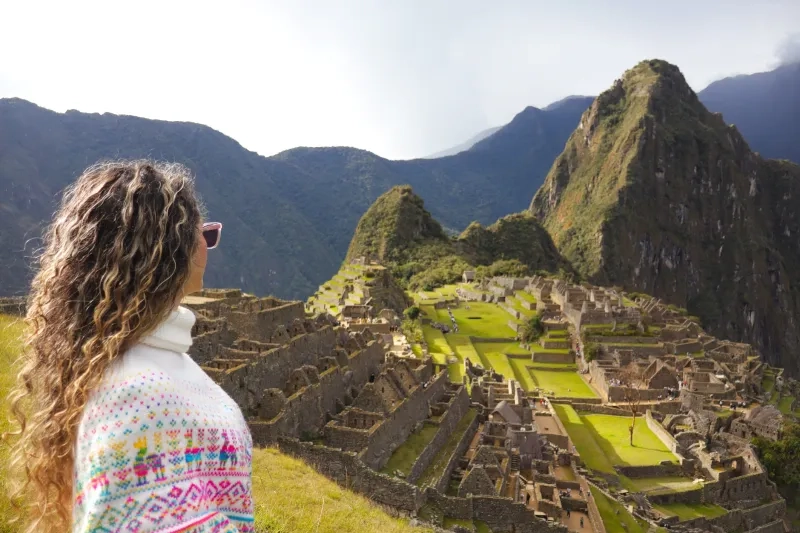 woman overlooking Machu Picchu