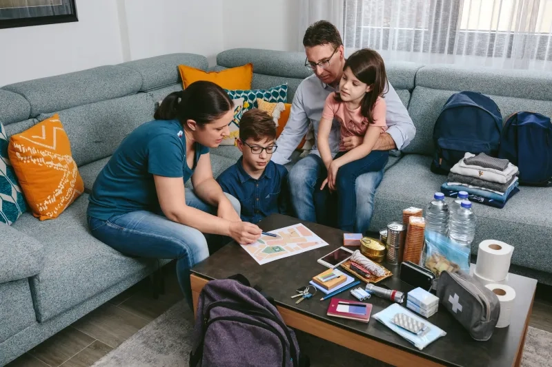 Family reviewing emergency plan