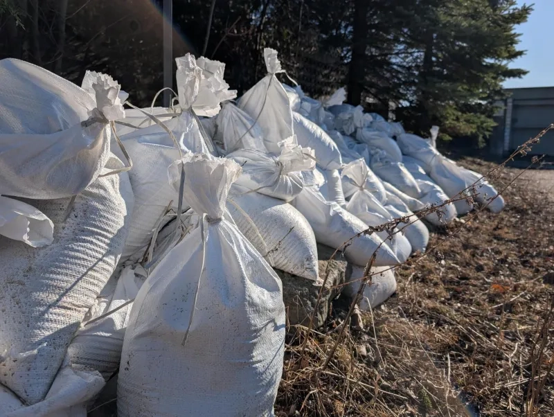 sand bags stacked together to form a flood wall