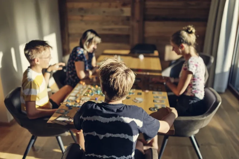 family playing a board game