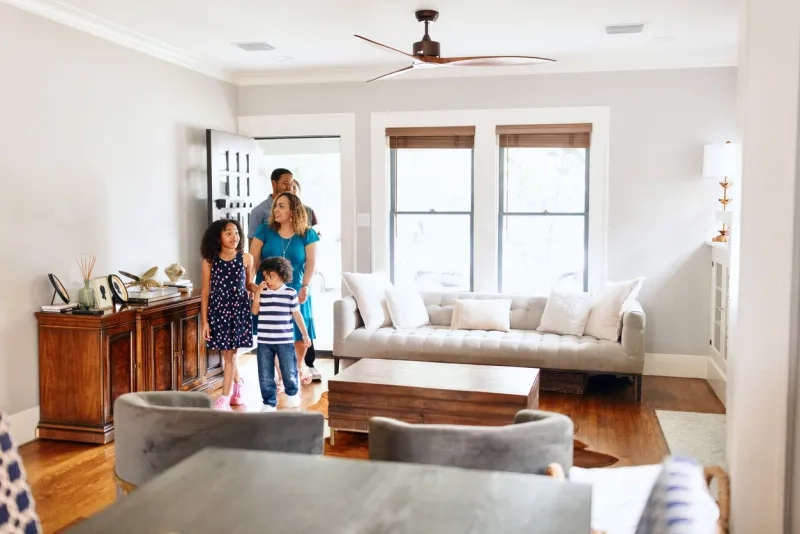Family walking into their home