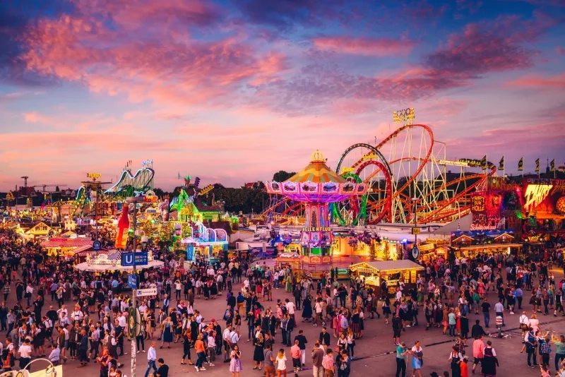 Visitors Walking Through Oktoberfest Fairgrounds